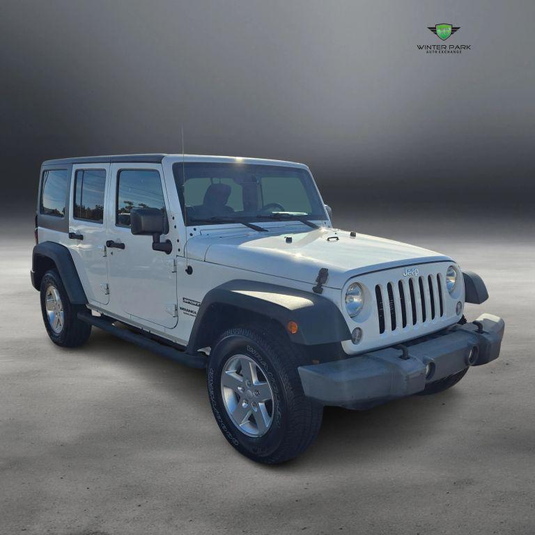 used 2015 Jeep Wrangler Unlimited car, priced at $13,988