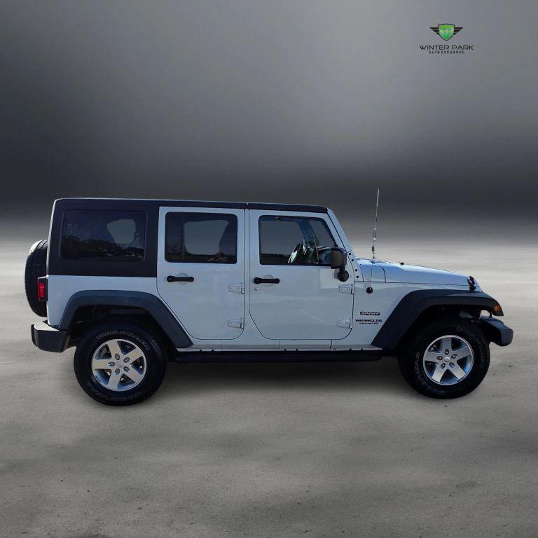used 2015 Jeep Wrangler Unlimited car, priced at $13,988
