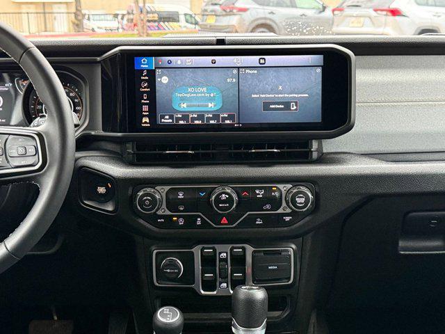 used 2025 Jeep Wrangler car, priced at $32,741