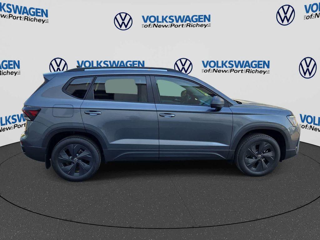 used 2025 Volkswagen Taos car, priced at $24,938