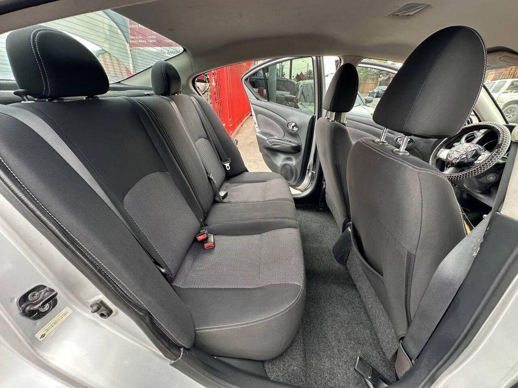 used 2014 Nissan Versa car, priced at $2,950