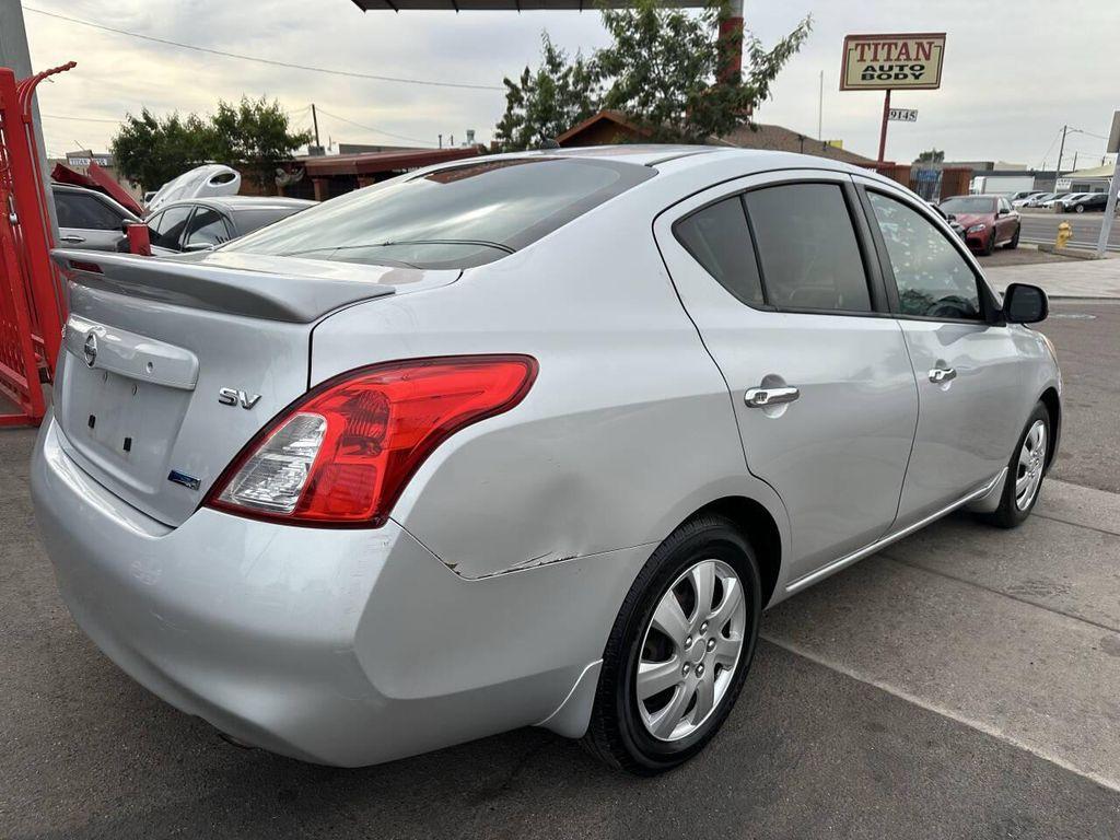 used 2014 Nissan Versa car, priced at $2,950