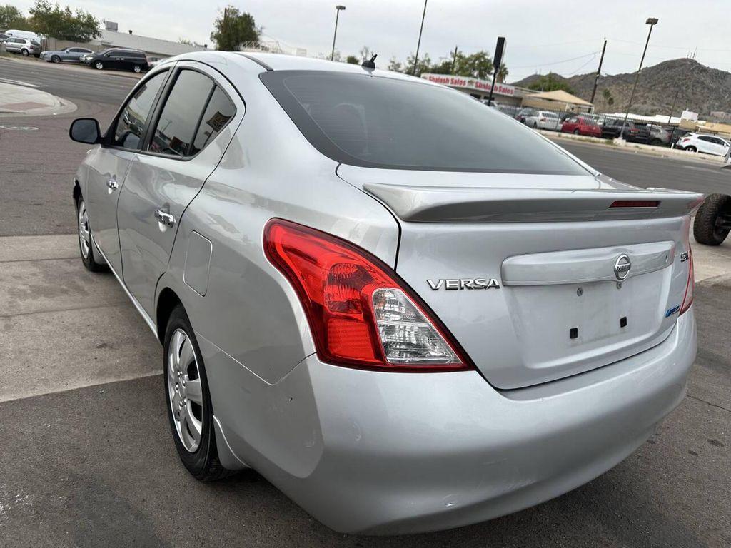 used 2014 Nissan Versa car, priced at $2,950
