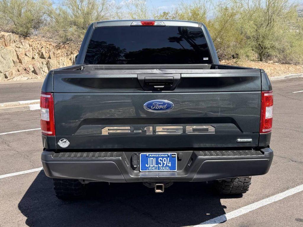 used 2018 Ford F-150 car, priced at $14,500