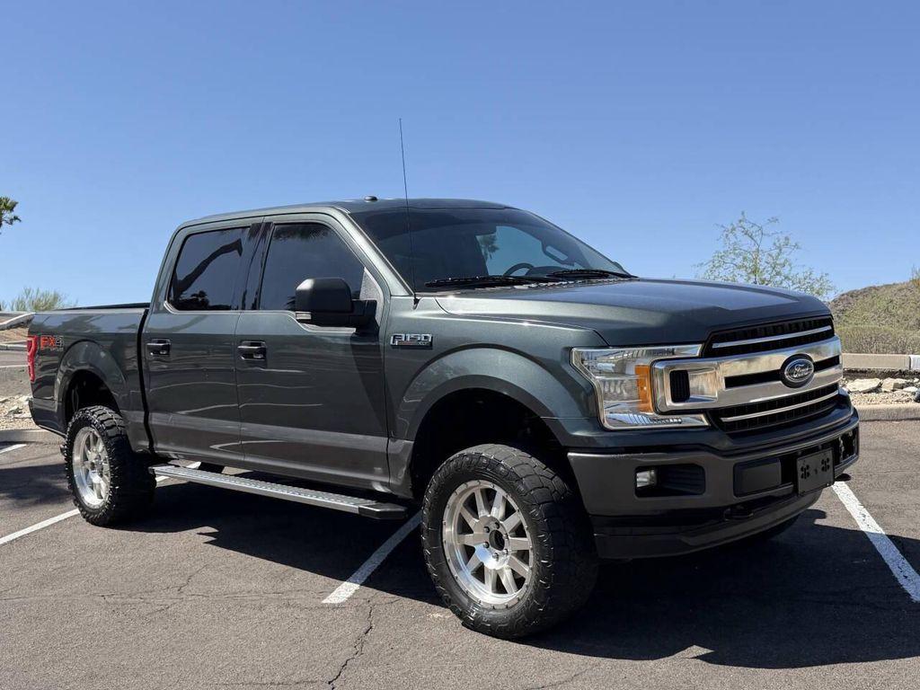 used 2018 Ford F-150 car, priced at $14,500