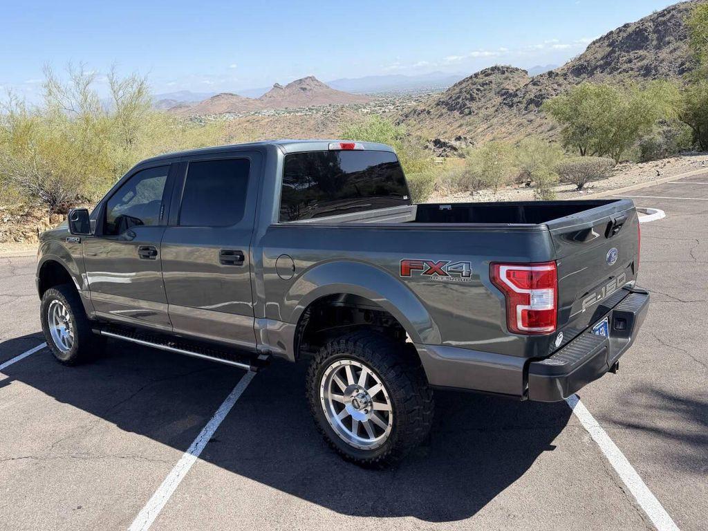used 2018 Ford F-150 car, priced at $14,500