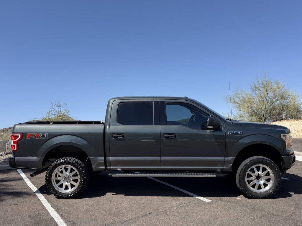 used 2018 Ford F-150 car, priced at $14,500