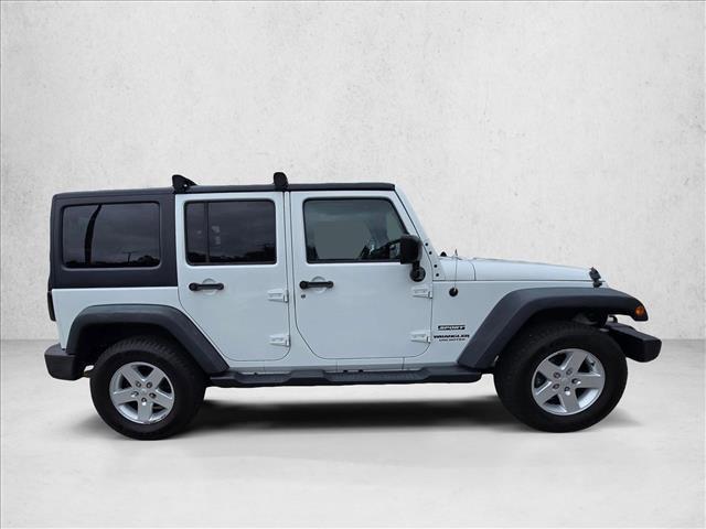 used 2015 Jeep Wrangler Unlimited car, priced at $12,449