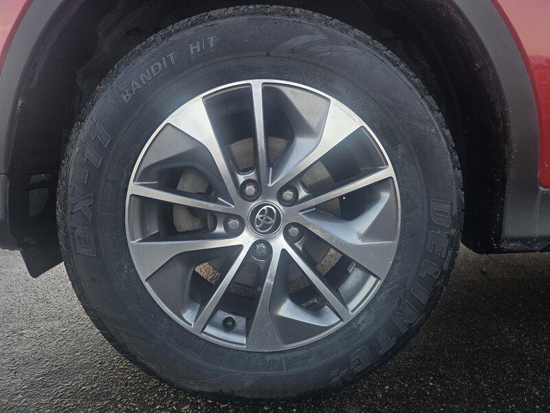 used 2014 Toyota RAV4 car, priced at $13,999