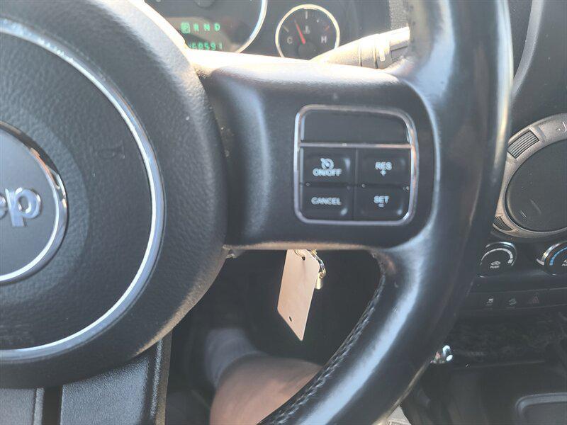 used 2013 Jeep Wrangler Unlimited car, priced at $11,999