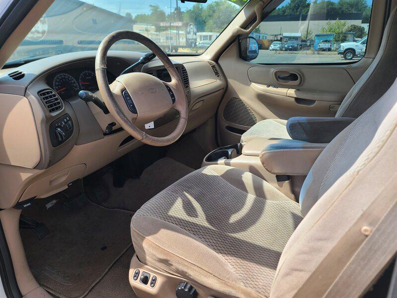 used 1999 Ford F-150 car, priced at $4,999