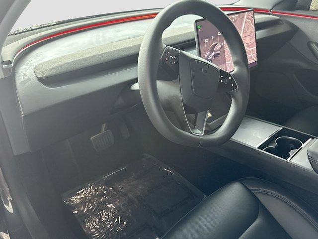 used 2025 Tesla Model 3 car, priced at $38,335