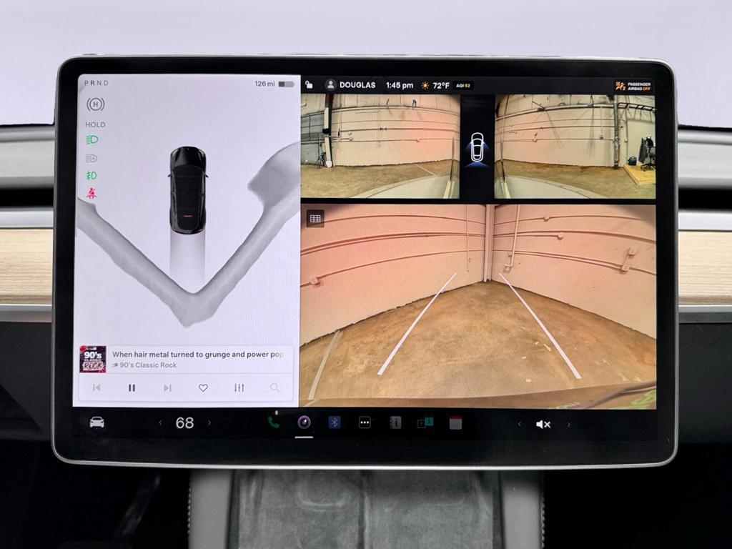 used 2025 Tesla Model Y car, priced at $38,275