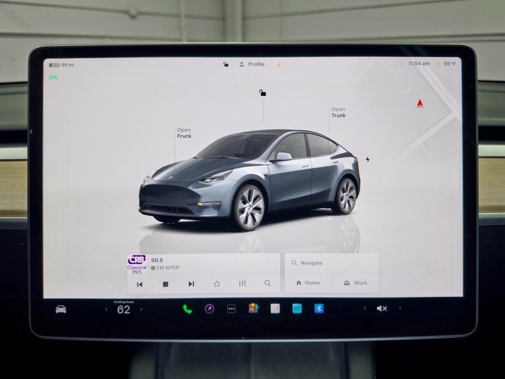 used 2023 Tesla Model Y car, priced at $34,599