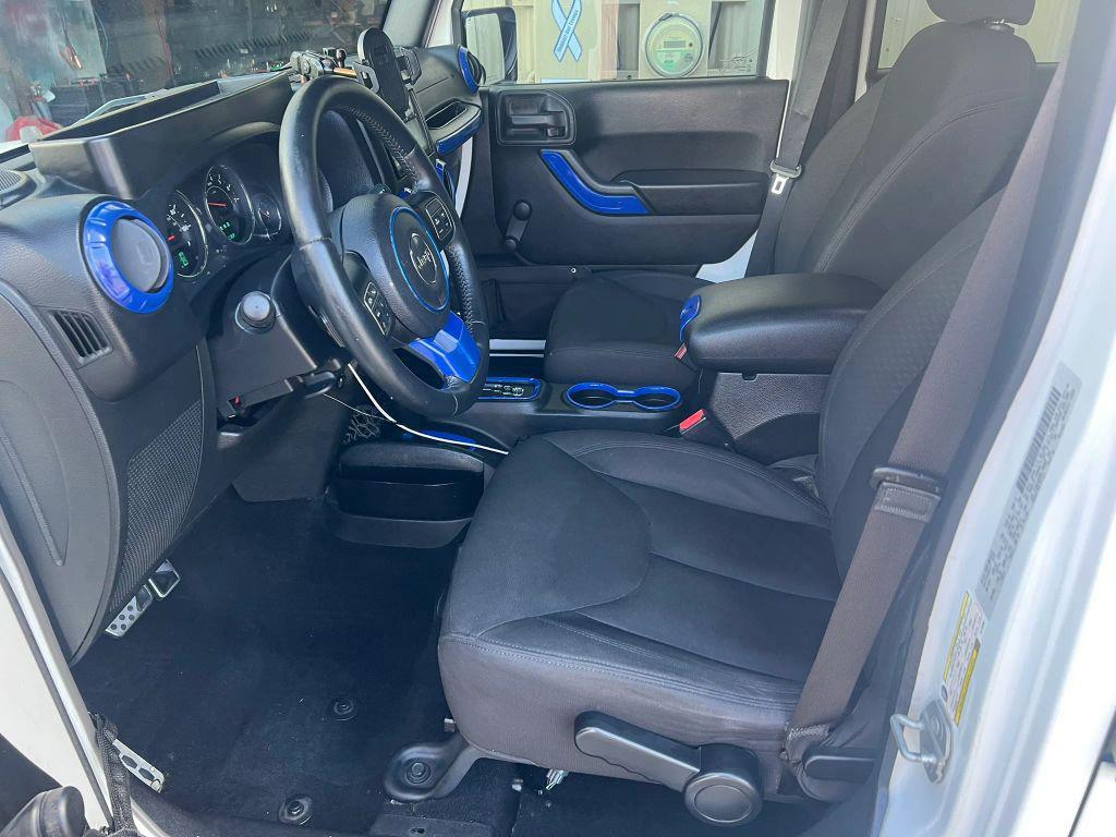 used 2015 Jeep Wrangler Unlimited car, priced at $14,388