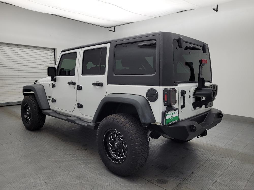 used 2014 Jeep Wrangler Unlimited car, priced at $23,095