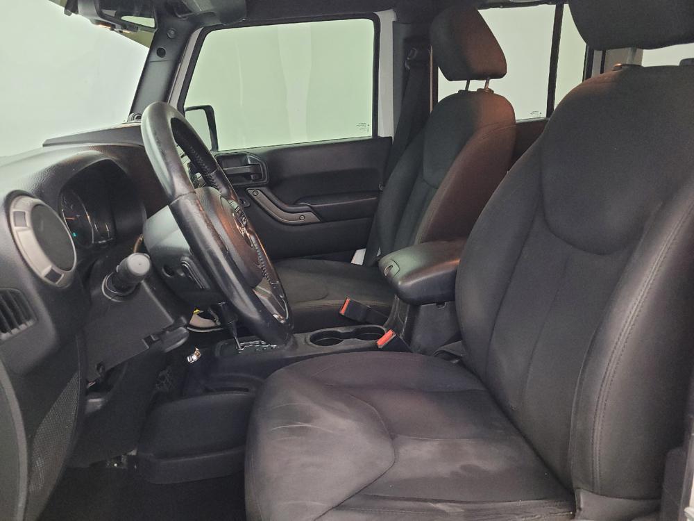 used 2014 Jeep Wrangler Unlimited car, priced at $23,095