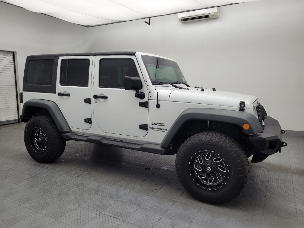 used 2014 Jeep Wrangler Unlimited car, priced at $23,095