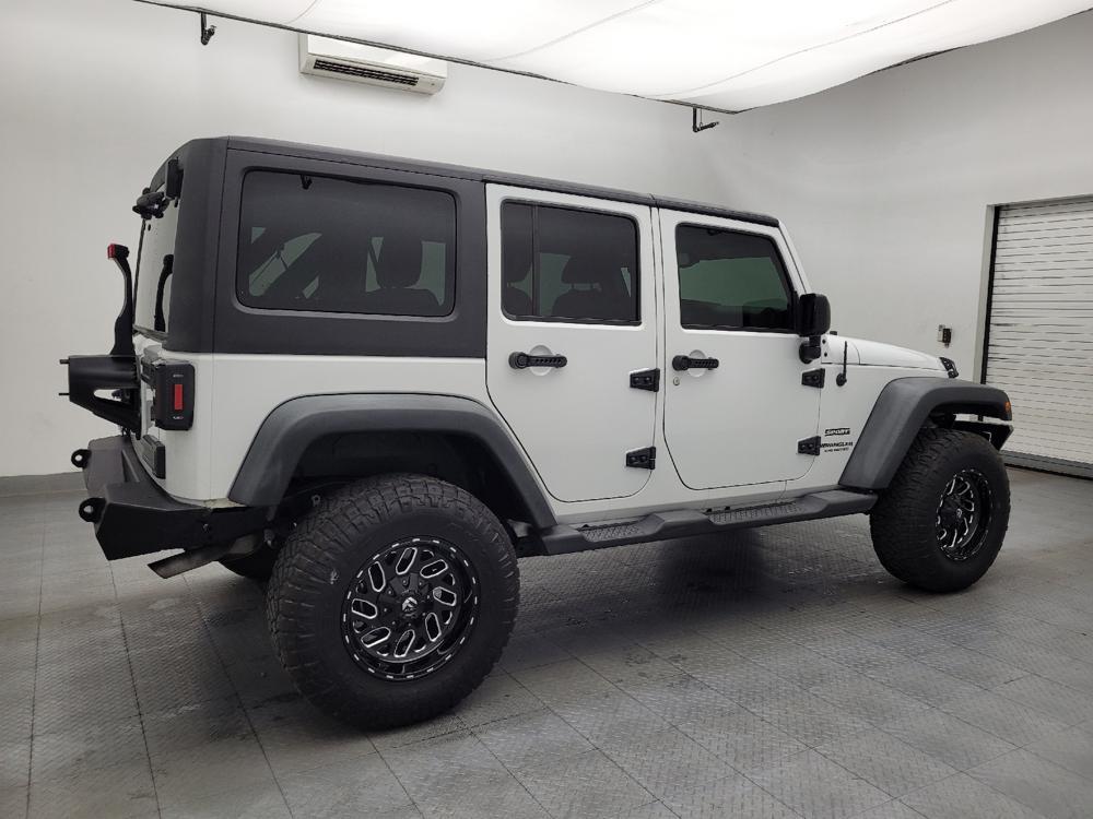 used 2014 Jeep Wrangler Unlimited car, priced at $23,095