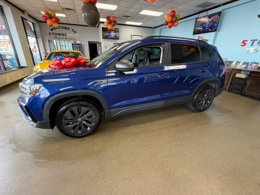 used 2022 Volkswagen Taos car, priced at $14,995