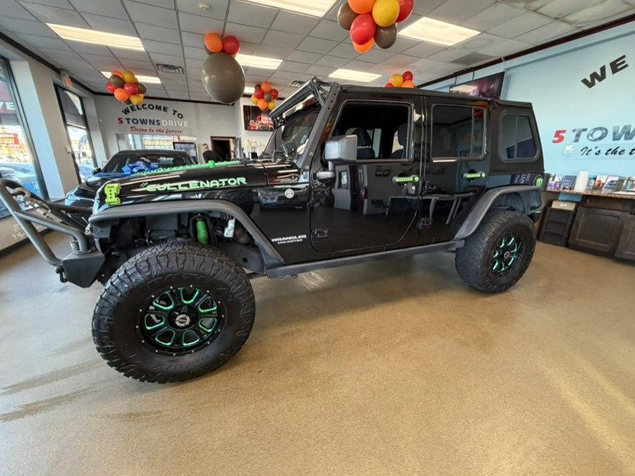 used 2013 Jeep Wrangler Unlimited car, priced at $14,995