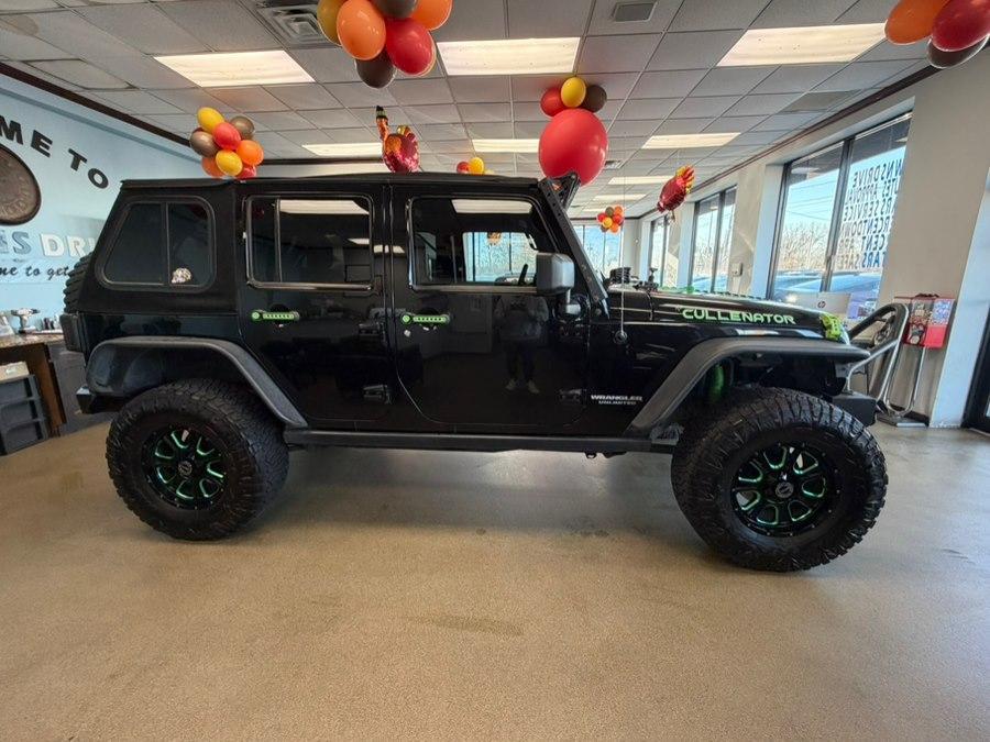 used 2013 Jeep Wrangler Unlimited car, priced at $14,995
