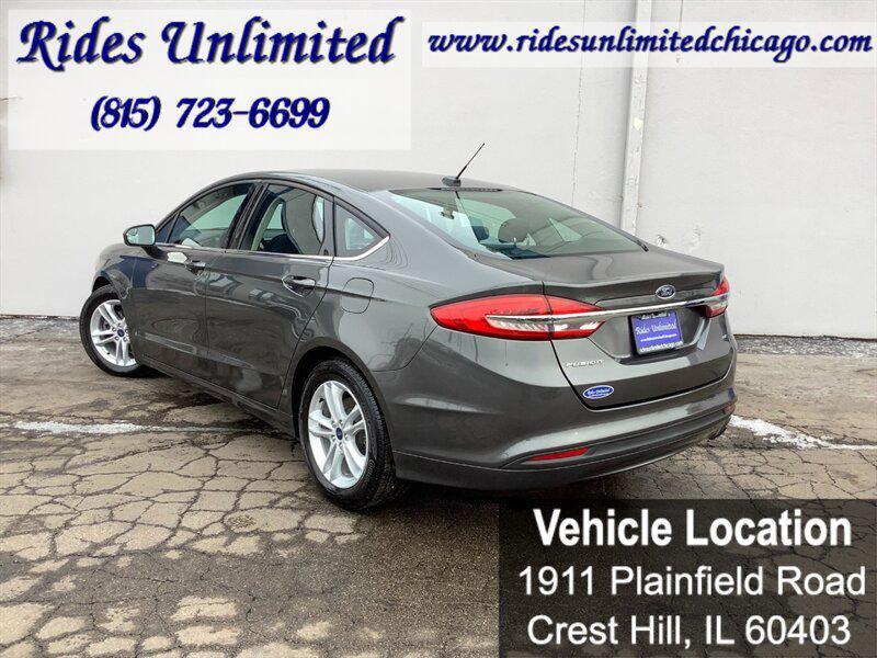 used 2018 Ford Fusion car, priced at $10,389