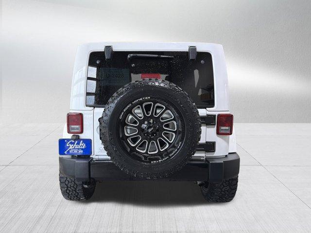 used 2014 Jeep Wrangler Unlimited car, priced at $18,988