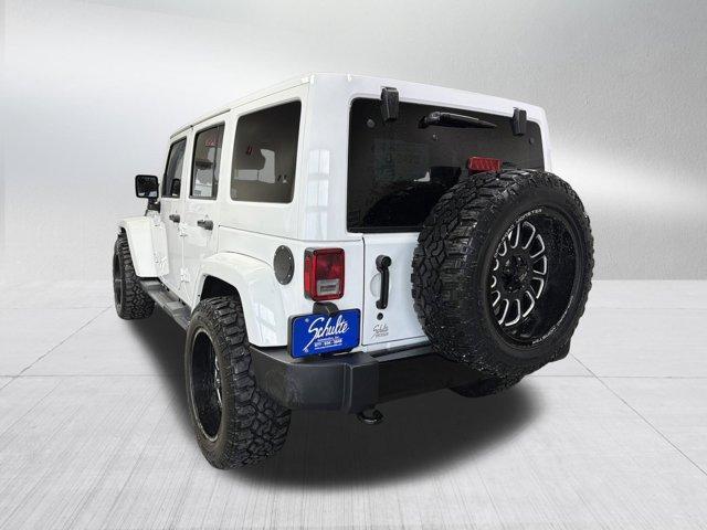 used 2014 Jeep Wrangler Unlimited car, priced at $18,988