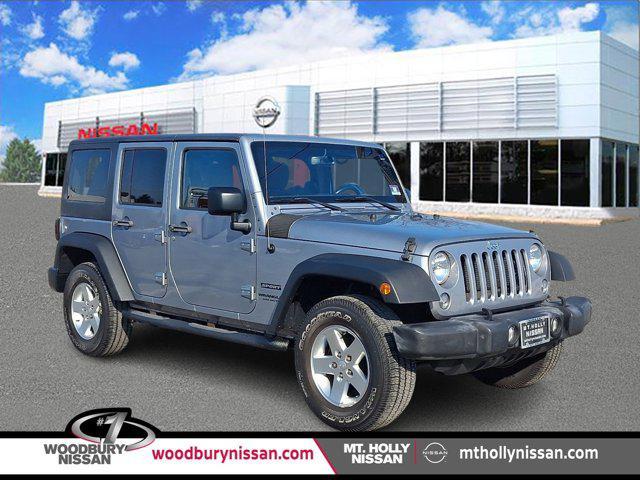 used 2015 Jeep Wrangler Unlimited car, priced at $18,900
