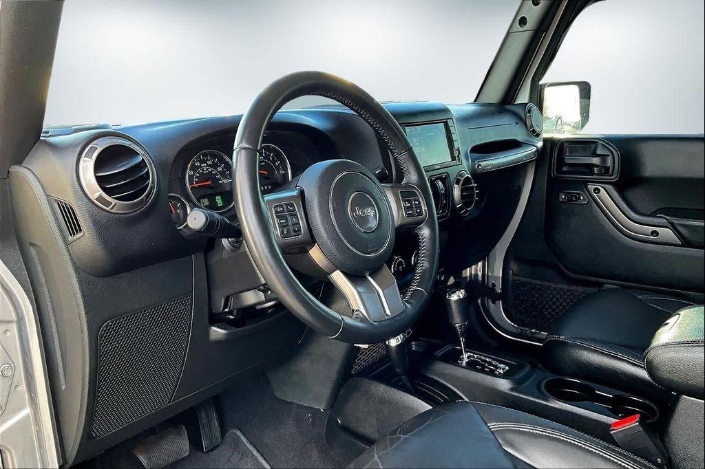 used 2018 Jeep Wrangler JK Unlimited car, priced at $23,488