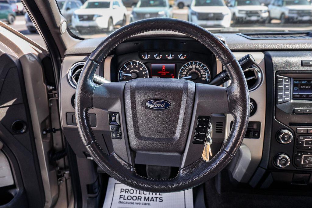 used 2014 Ford F-150 car, priced at $23,399