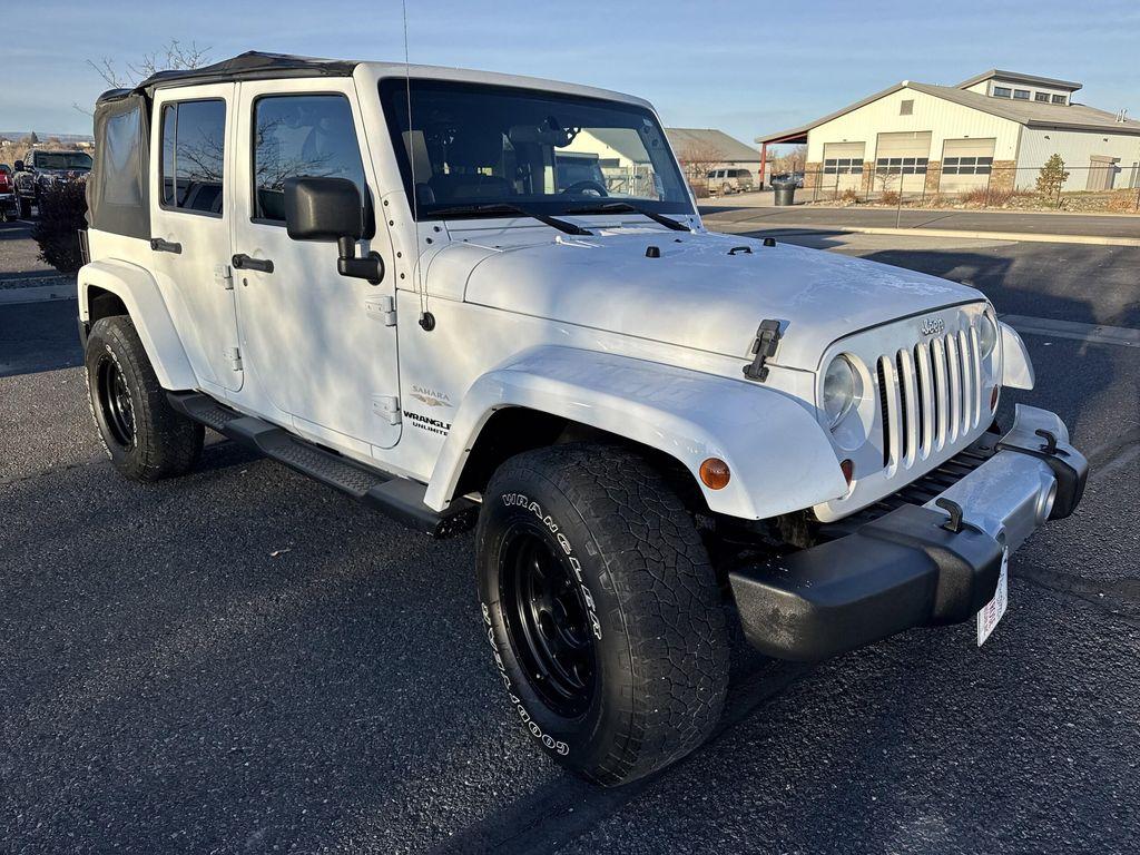 used 2012 Jeep Wrangler Unlimited car, priced at $14,399