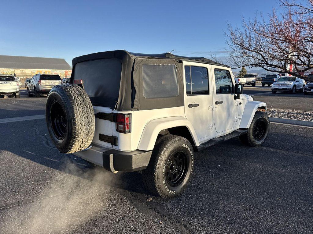 used 2012 Jeep Wrangler Unlimited car, priced at $14,399