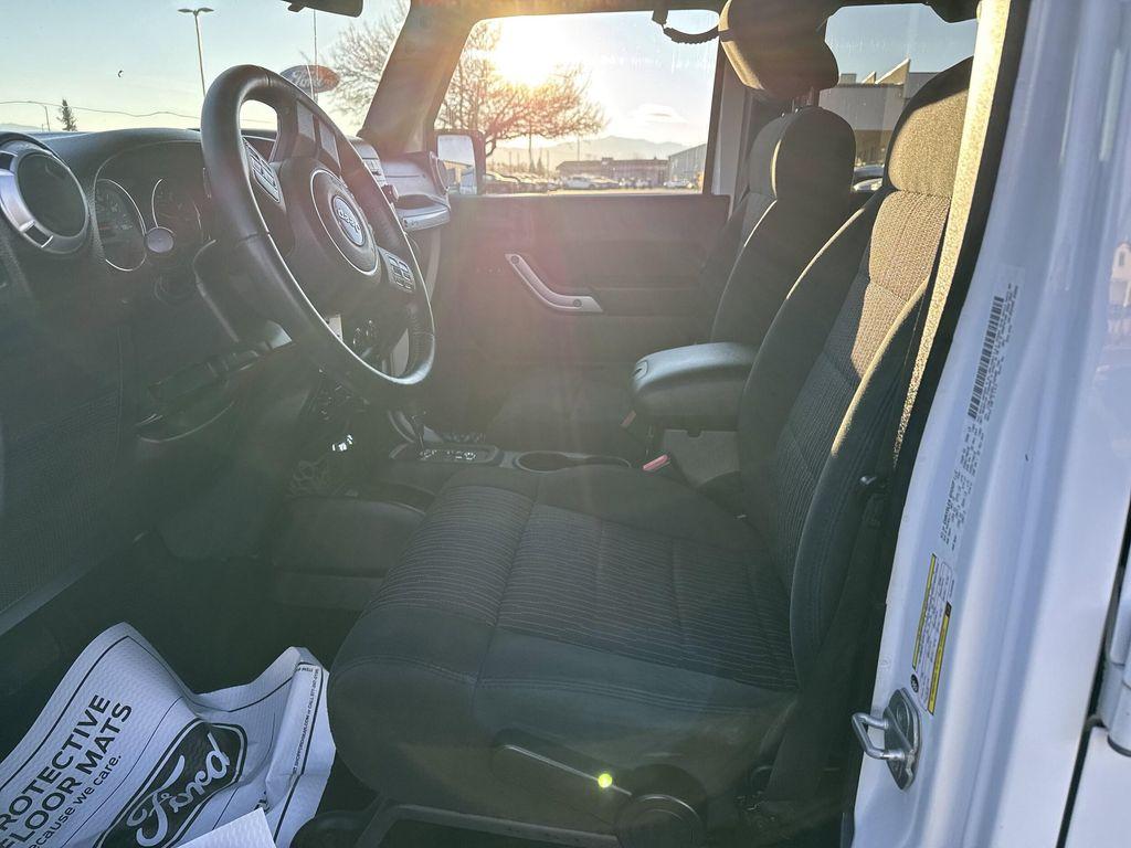 used 2012 Jeep Wrangler Unlimited car, priced at $14,399