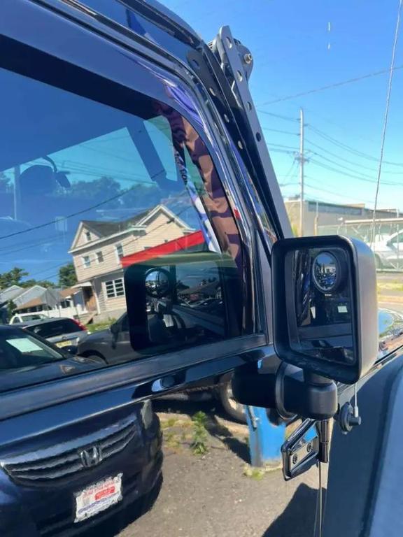 used 2015 Jeep Wrangler Unlimited car, priced at $17,499