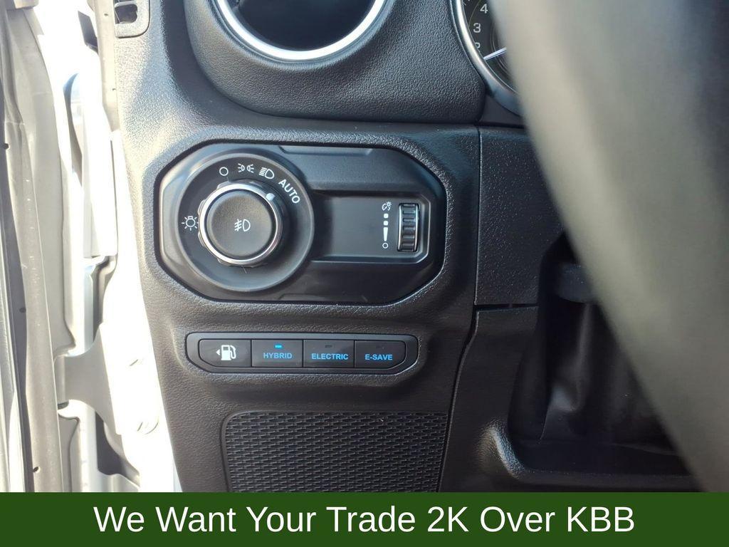 used 2023 Jeep Wrangler 4xe car, priced at $30,812