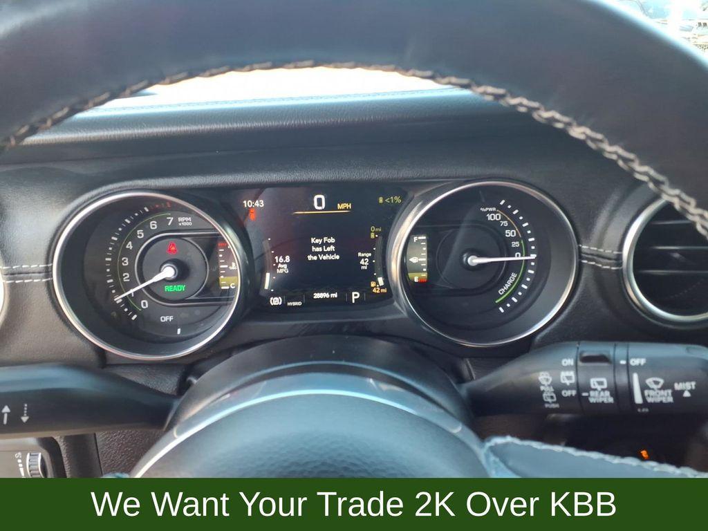 used 2023 Jeep Wrangler 4xe car, priced at $30,812