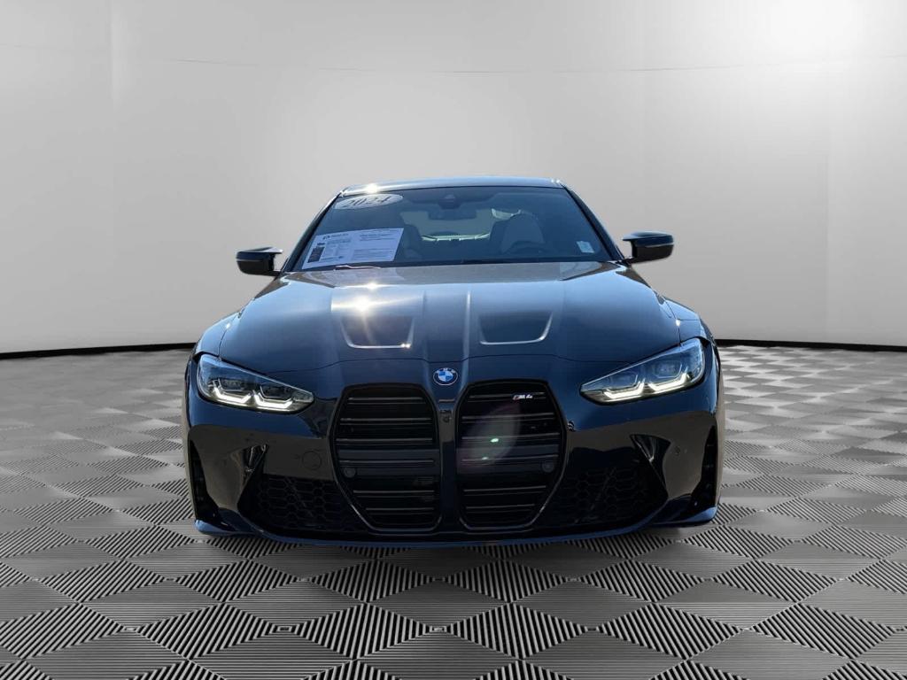 used 2024 BMW M4 car, priced at $75,353