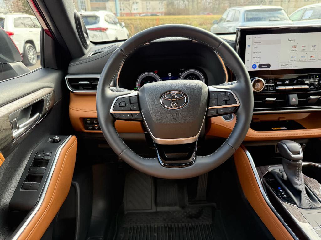 used 2024 Toyota Highlander Hybrid car, priced at $48,995