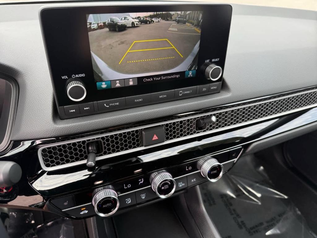 used 2025 Honda Civic Hybrid car, priced at $27,644