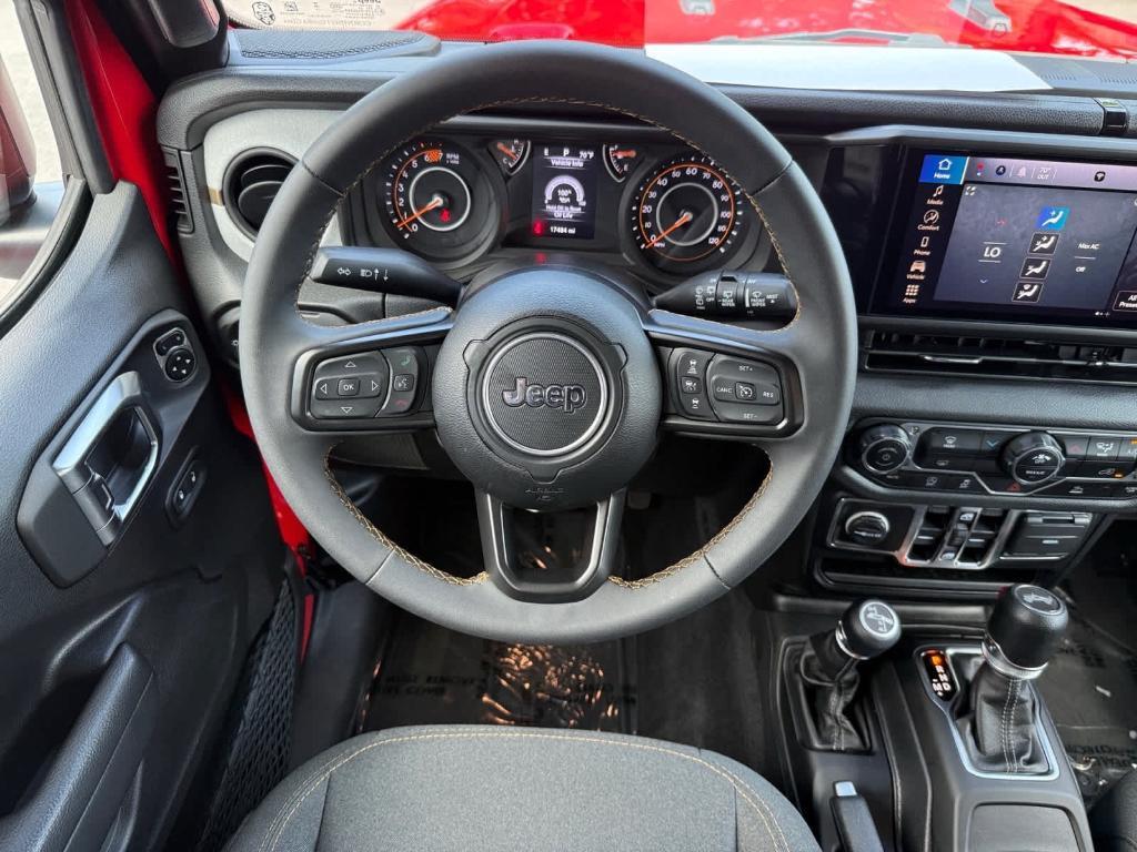 used 2024 Jeep Wrangler car, priced at $34,287