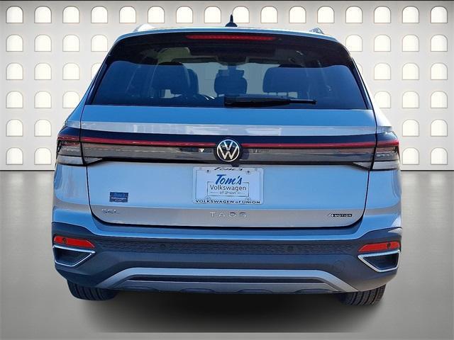 used 2025 Volkswagen Taos car, priced at $31,999