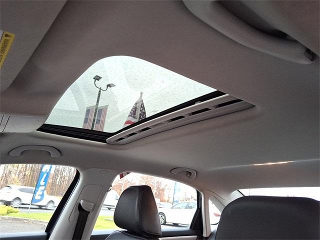 used 2021 Volkswagen Passat car, priced at $16,997