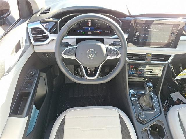 new 2025 Volkswagen Taos car, priced at $33,499