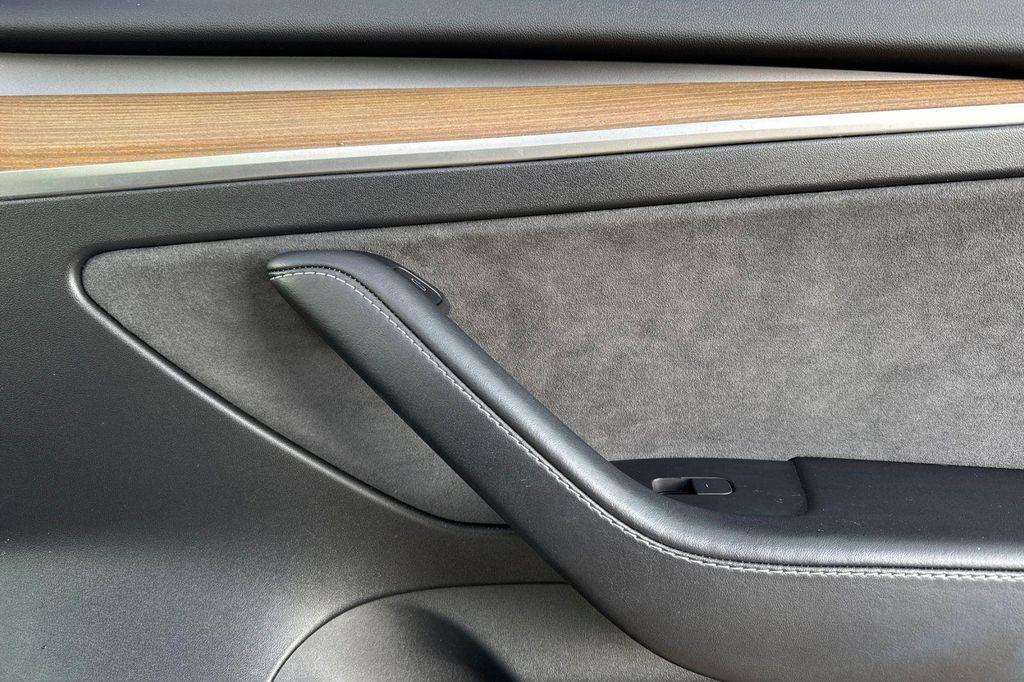 used 2023 Tesla Model 3 car, priced at $19,950