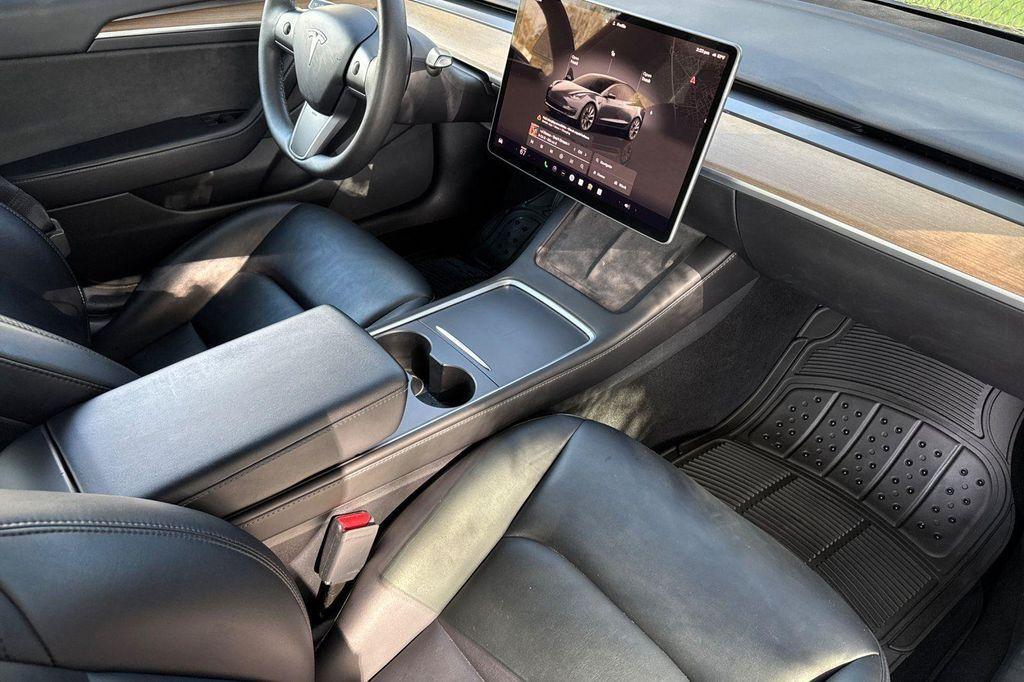 used 2023 Tesla Model 3 car, priced at $19,950