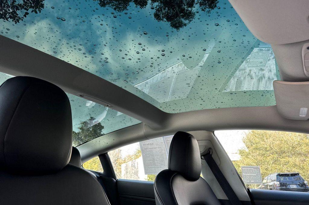 used 2023 Tesla Model 3 car, priced at $19,950