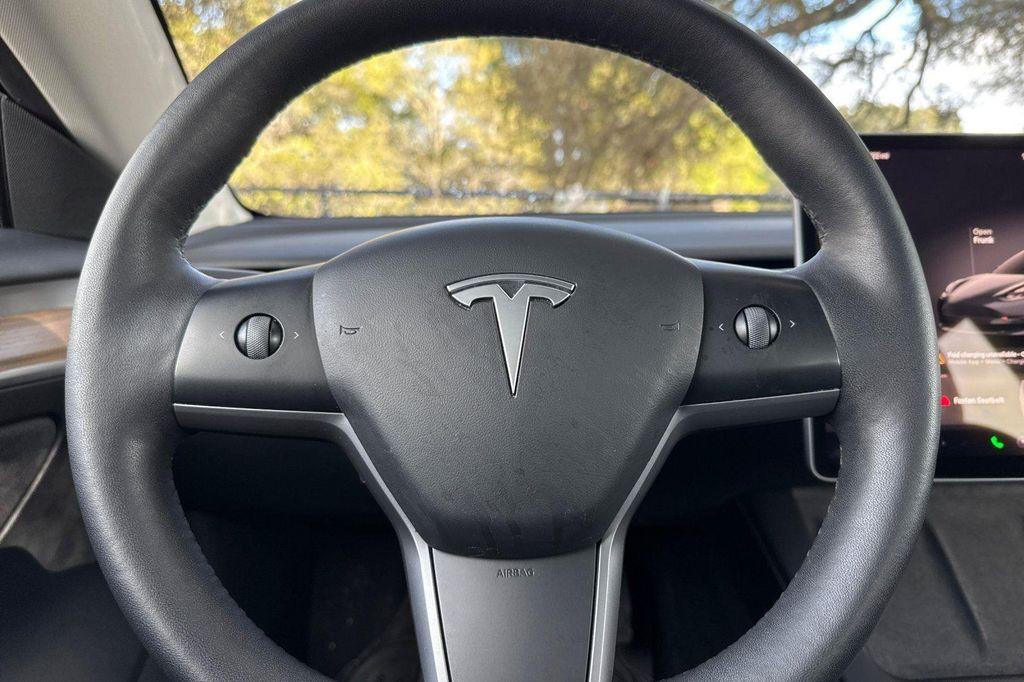 used 2023 Tesla Model 3 car, priced at $19,950