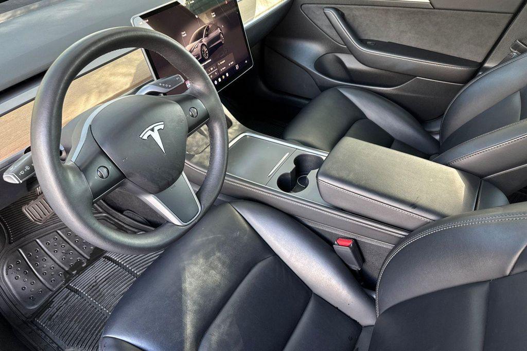 used 2023 Tesla Model 3 car, priced at $19,950